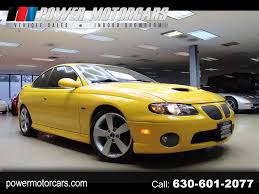 Image result for Yellow 2004 Pontiac