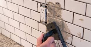 One of the worst grouting and caulking jobs we saw involved using white caulk on dark marble surround. How To Grout A Tile Backsplash Like A Pro