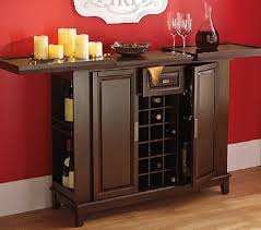 Amazon Com Wine Bar Liquor Cabinet Expanding Top Entertainment Center Buffet Server Deep Walnut Finish Furnit Home Bar Furniture Wine Bar Cabinet Cabinet