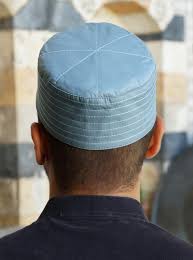 Man wearing kufi hat wall decor. Light Talib Kufi Hat Kufis Men
