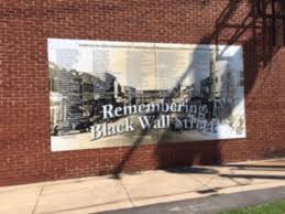 Darius kirk looks at a mural depicting the tulsa race massacre in the historic greenwood neighborhood ahead of the centennial commemorations of the massacre, on may 27, 2021, in tulsa, okla. History Lesson 1921 Tulsa Race Massacre Local News Theadanews Com