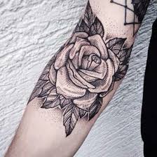 Amazing Rose In The Ditch Of The Elbow Rose Tattoos For Men Traditional Rose Tattoos Rose Tattoos