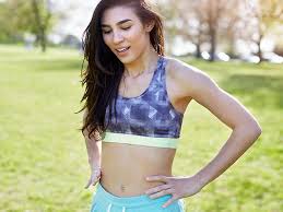 Standing alternating toe touches is a dynamic standing abs exercise targeting lower abs and obliques. How To Do A Standing Toe Touch Warm Up Self