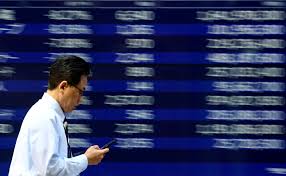 Stocks, dollar show resilience in Asia as oil gains
