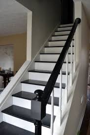 Dueling Diy So I Creep Staircase Makeover Stair Renovation Black And White Stairs