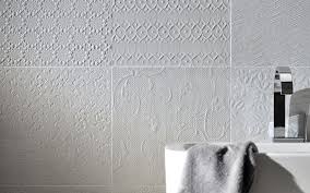 A Beautiful Looking Tile That Features A Mix Of Different Embossed Patterns Available In Soft White Or Soft Grey 300x Embossed Tile Tiles Wall And Floor Tiles