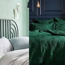 On the wall, we do see a couple of paintings that are shielded by this bedroom features that exposed brick and on that brick are very different pieces of wall art. Green Bedroom Ideas Emerald Sage And Dark Green Inspiration