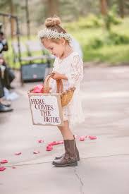 Wedding Hairstyles Rustic Lace Flower Girl Dress Bun Hairstyle With Baby S Breath Crown Listfender Leading Inspiration Magazine Shopping Trends Lifestyle More