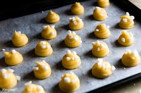Download Premium Image Of Piped Choux Pastry On A Tray 485867 Choux Pastry Raisin Recipes Pastry