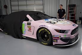 The paint schemes will also look radically different, with numbers pushed back against the rear wheel well to offer additional sponsorship space on the door. Kevin Harvick S Pretty In Pink For The All Star Race Nascar Com