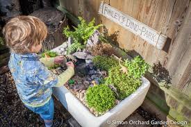 How To Create A Mini Dinosaur Garden Simon Orchard Garden Design Dinosaur Garden Child Friendly Garden Toddler Garden