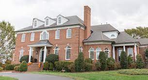 Here, the house uses original red brick stones on the small porch and the below section wall. Dark Gutters And How It Can Transform Your House 1021 Home