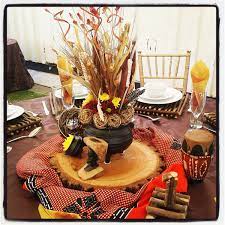 This setup maximizes space, which makes it one of the best wedding seating chart ideas if you have a larger guest list. Traditional African Wedding Centerpieces And Decor Www Facebook Com Joburgtents African Decor Traditional Wedding Table Decorations Traditional Wedding Decor