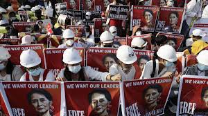 In this image provided by the democratic voice of burma (dvb), protesters in yangon hold images of. Myanmar Coup Terrified Un Envoy Issues Warning As Protesters Face Down Military Cnn