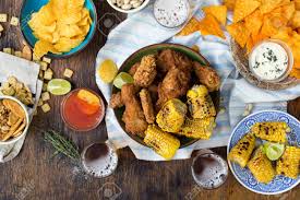 Whether you're making dinner for your family or you're looking for an easy chicken casserole for a dinner party, we've got every variation to fit your needs. Fried Chicken Beer And Snacks To Beer On Wooden Table Top View Party Dinner Table Concept Stock Photo Picture And Royalty Free Image Image 84009330