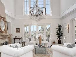 The secret to keeping a monochromatic space from veering into boring territory is paying close attention to the details, both architectural—exposed. Gorgeous Traditional Style All White Living Room Decor With White Tuf White Living Room Decor Traditional Style Living Room Traditional Style Living Room Decor