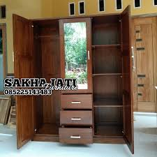 Menggunakan lemari tanpa pintu bukan berarti pakaianmu di dalam lemari akan cepat kotor dan berdebu karena tirai efektif untuk menjaga kebersihan isi lemari. Jual Lemari 3 Pintu Minimalis Lemari Pakaian Lemari Gantung Kayu Jati Di Lapak Sakha Jati Furniture Jepara Bukalapak