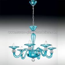 What makes it really unique are the blue frosted glass beads swags which convey a luminous and light look to this stunning piece. Ermione Murano Glass Chandelier Murano Glass Chandeliers