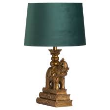 When choosing lighting for space, buffet lamps hold a lot of charm and take up little space. Antique Gold Elephant Table Lamp With Emerald Green Shade Lighting From Breeze Furniture Uk