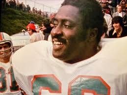 The Dolphins are all smiles, preparing for their game against the Jets.  That's Marv Fleming; and Larry Little, with Howard Twilley in the  background. Listen to TWIPF: The Podcast, 1973, Week 7.