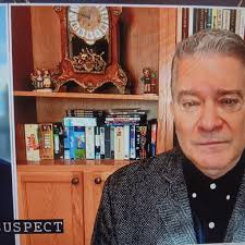 What VHS titles can be identified in the photo?