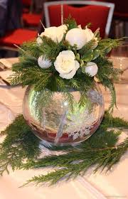 Corporate Holiday Party Frozen White And Blue Winter Theme Christmas Table C Christmas Flower Arrangements Christmas Floral Arrangements Holiday Centerpieces