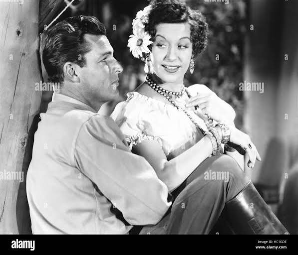 NABONGA, from left, Buster Crabbe, Fifi D'Orsay, 1944 Stock Photo - Alamy