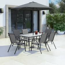 Choose your garden dining set from a wide range of materials and sizes, so you can get a coordinated look that fits your outdoor space perfectly. 6 Seater Outdoor Dining Set With Parasol Grey And Black Furniture123