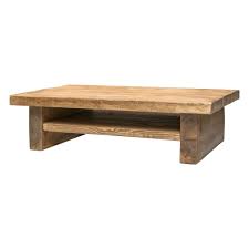 This arrangement leaves enough room for walking, and makes it easy for everyone to take a seat on the sofa's deep cushions. Chopwell Chunky Wooden Coffee Table With Shelf