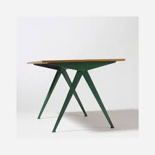 lot 254 jean prouve compas table 1953 enameled steel oak 50 w x 33 d x 27 h in estimate 5 000 7 000 provenance enameled steel prouve east hampton