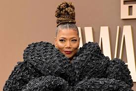 Queen Latifah Bundles Up in a Bold, Oversized Coat on the 2026 BET Awards Red Carpet
