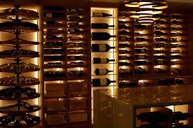 When choosing the best wine cellar lighting, you need to pay attention to heat. Industrial Chic Oklahoma City Wine Cellar Revel Custom Wine Cellars