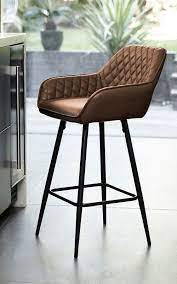 This simple, stylish set of 2 bar stools is the perfect understated design your counter is craving! Next Hamilton Black Leg Bar Stool Tan Breakfast Bar Chairs Bar Stools Brown Leather Bar Stools