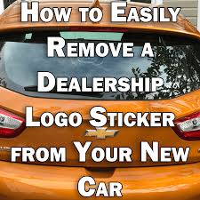 Wipe away or scrape away the softened glue with rags and a plastic scraper. How To Easily Remove A Dealership Logo Sticker From Your New Car Axleaddict