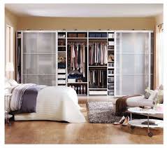 An Image Of An Ikea Pax Wardrobe System With Sliding Doors The Go Across A Full Wall To Provide A Large Ikea Bedroom Furniture Ikea Pax Wardrobe Ikea Wardrobe