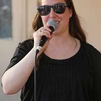 A Mongolian boy sings for distinguished visitors during