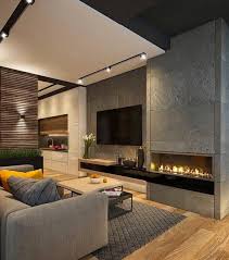 The contemporary lines and the smoothness of the mantel provide a contrast to the rustic stone. A Great Living Room The Fireplace Burning Let The Night Begin Love The Content Sup Contemporary Living Room Design Entertainment Room Design House Design