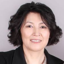 Whitworth Assistant Professor of Political Science Aaron Hitefield and two… 