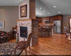 Fireplace In Middle Of Living Dining Room Fireplace Design Home Fireplace Brown Living Room Decor
