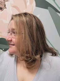 She wanted to blend her silver streaks with semi-permanent color and add  some warm highlights. This natural look will allow her to go longer between  hair color appointments with worrying about the ...