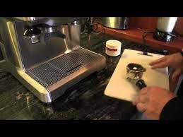 Lock the portafilter into the group head. Breville Espresso Machine Cleaning 2021 Ultimate Guide