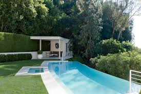Pool located in the garden as an outdoor swimming pool has its own advantages and disadvantages, as is the case with covered pool located beside the house or in it. 20 Wonderful Pool House Design Ideas Modern Pool House Ideas Foyr