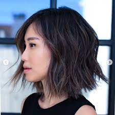 Short To Medium Hairstyles That Ll Freshen Up Your Look Stat Layerless Long Bob Medium Hair Styles Medium Short Hair Hair Styles