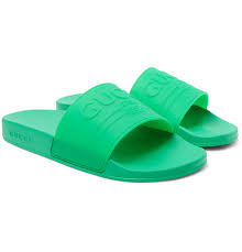 Gucci Logo Embossed Rubber Slides Men Bright Green The Fashionisto Gucci's cult 'pursuit' slides have contoured footbeds and feature one of the creative director's latest monikers embroidered at the canvas toe strap 0 the 'gucci worldwide' logo is made up of flags and an outline of the globe.shown here with: gucci logo embossed rubber slides men bright green