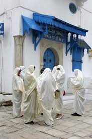 How many years from 2021 to 2050? March 2009 Tunisian Muslim Women In Traditional Tunisia Clothes In The Old Town Of Sidi Bou Said Near The City Of Tunis Indivstock
