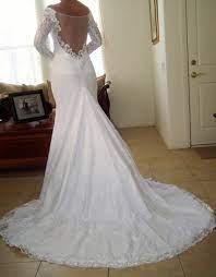 Do you dream of wearing a long sleeve wedding dress on your big day? New Never Used Long Sleeve Lace Mermaid Silhouette Wedding Dress