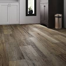 Jun 17, 2021 · luxury vinyl plank flooring, or lvp flooring, is 100 percent synthetic flooring that is made to look and feel like real wood. Smartcore Pro Claremount Oak Wide Thick Waterproof Interlocking Luxury 16 54 Sq Ft Lowes Com In 2021 Luxury Vinyl Plank Flooring Vinyl Plank Flooring Vinyl Plank