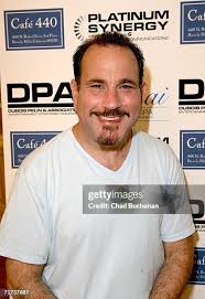 Publicist Greg Eppich and actress Sharon Stone pose at the Nespresso...  News Photo