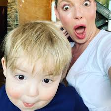 Funny faces with Stinkews. He really does love looking at himself in the  camera...or a mirror...or any reflective surface he can find. I guess we're  all a little guilty of that these