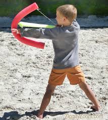 3 comments activity , adventure , boys , camping , diy , fun , kids , mom , outdoor fun , tutorial my boys love to use hangers as bows and pretend they are shooting invisible arrows at whatever they are hunting or being chased by. Pool Noodle Bow Arrow Ziggity Zoom Family